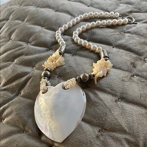 Elegant Pearl Necklace with Floral Details